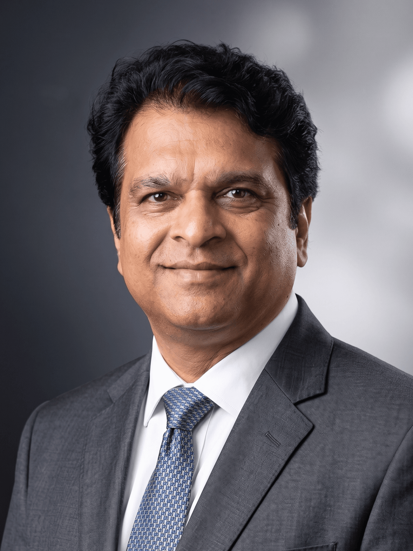 Navin Mahajan - Founder & Director